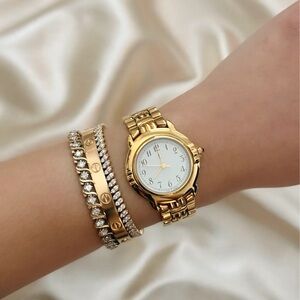 AUTHENTIC RARE VINTAGE YVES SAINT LAURENT GOLD WATCH